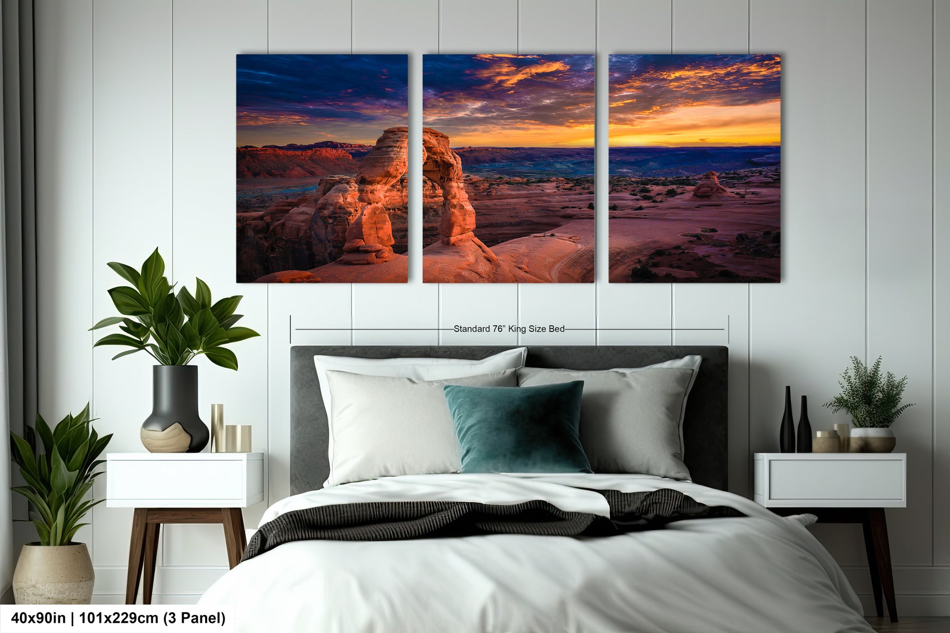 a bedroom scene with a bed and two paintings