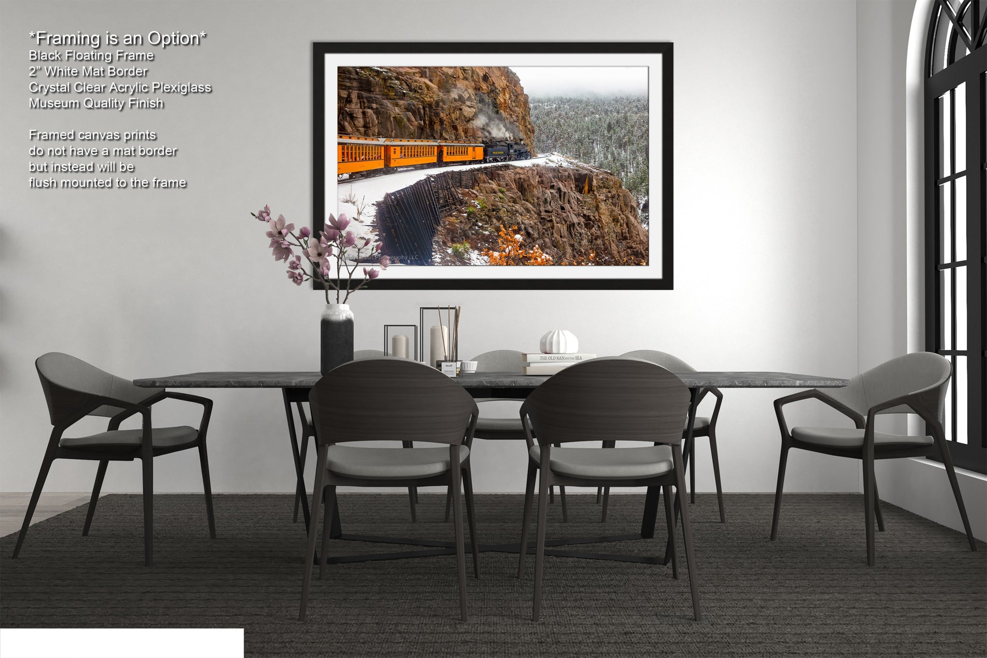 a picture of a dining room with a table and chairs