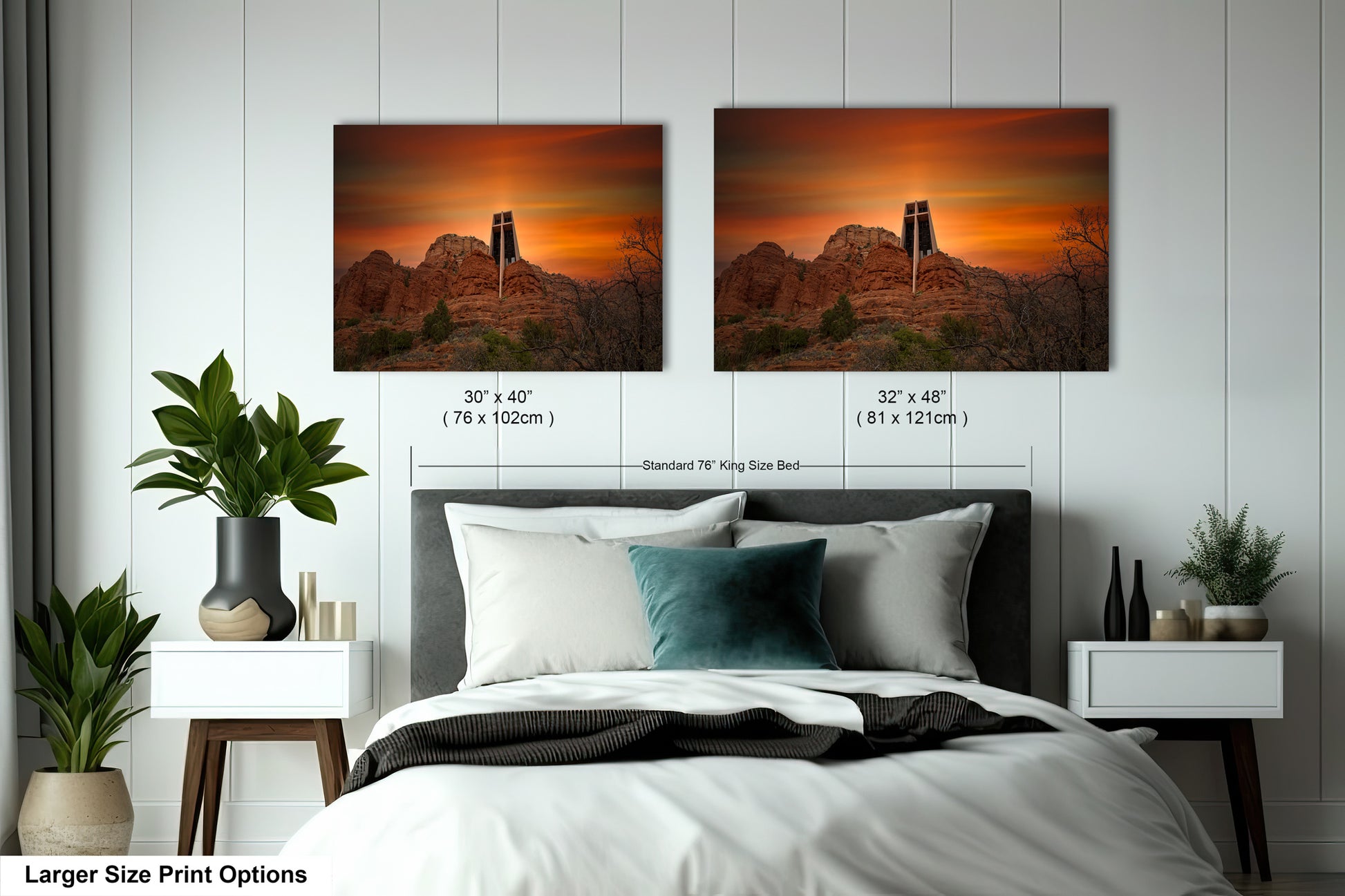 a bedroom with a bed and two pictures on the wall