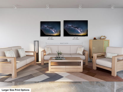 a living room filled with furniture and a painting on the wall