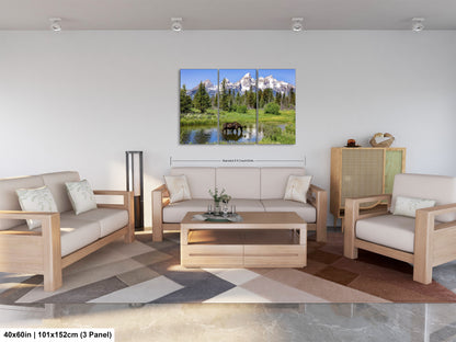 a living room filled with furniture and a painting on the wall