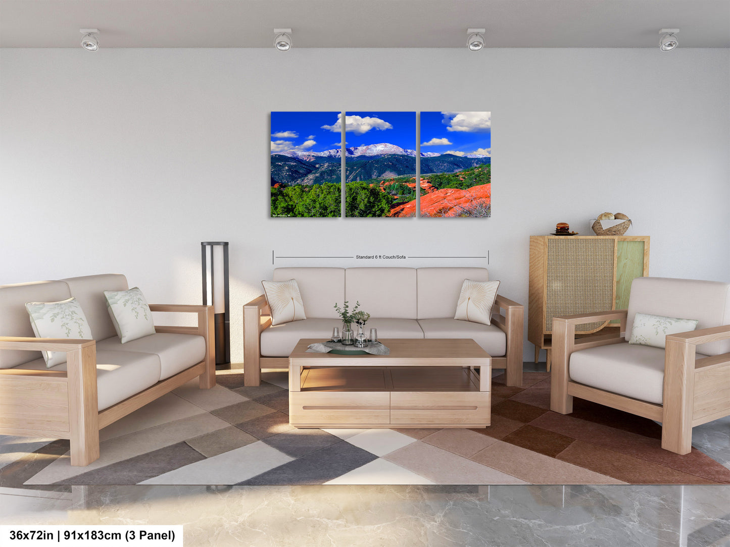 a living room filled with furniture and a painting on the wall
