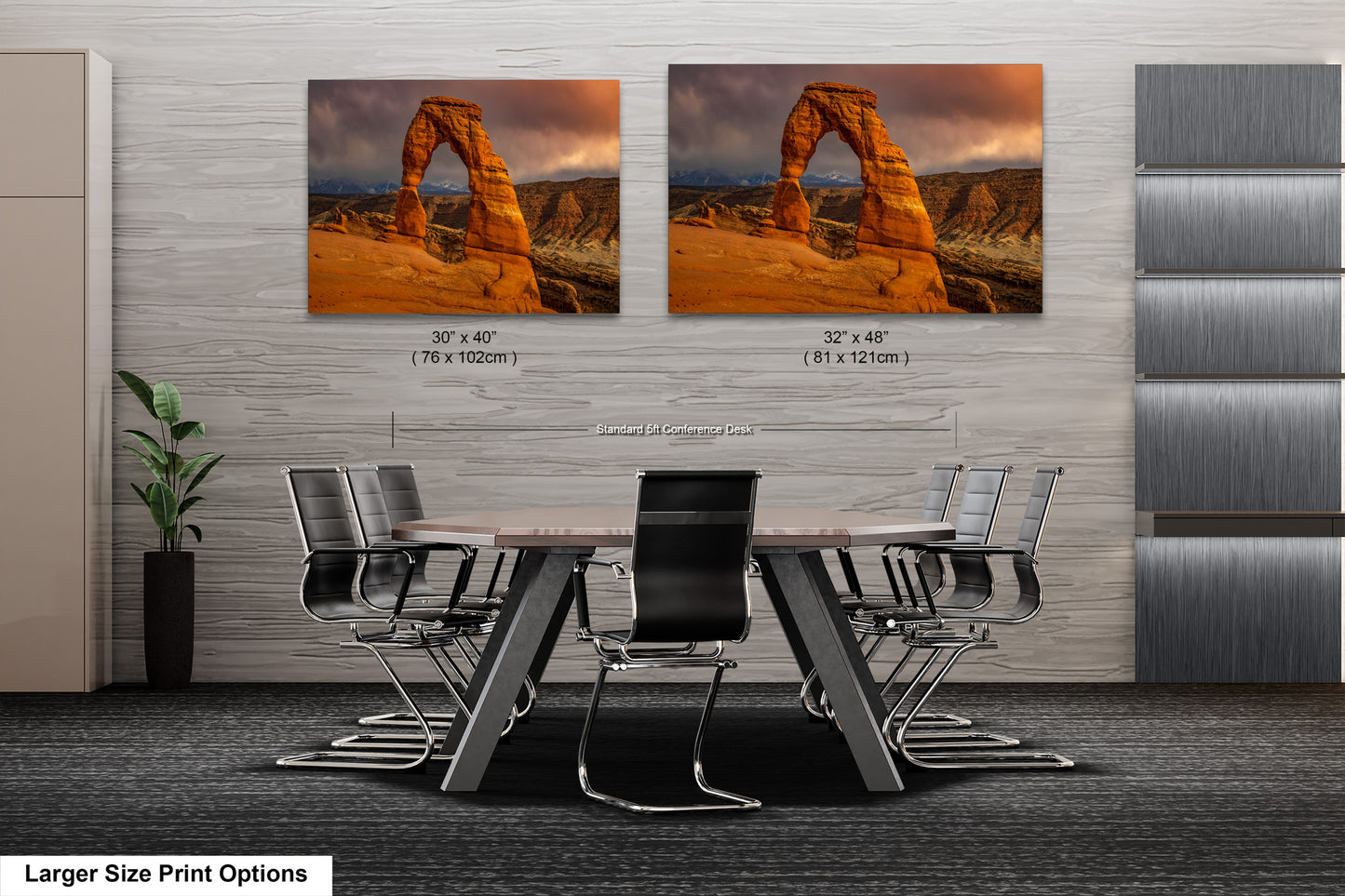 a dining room table with chairs in front of a wall with a picture of a
