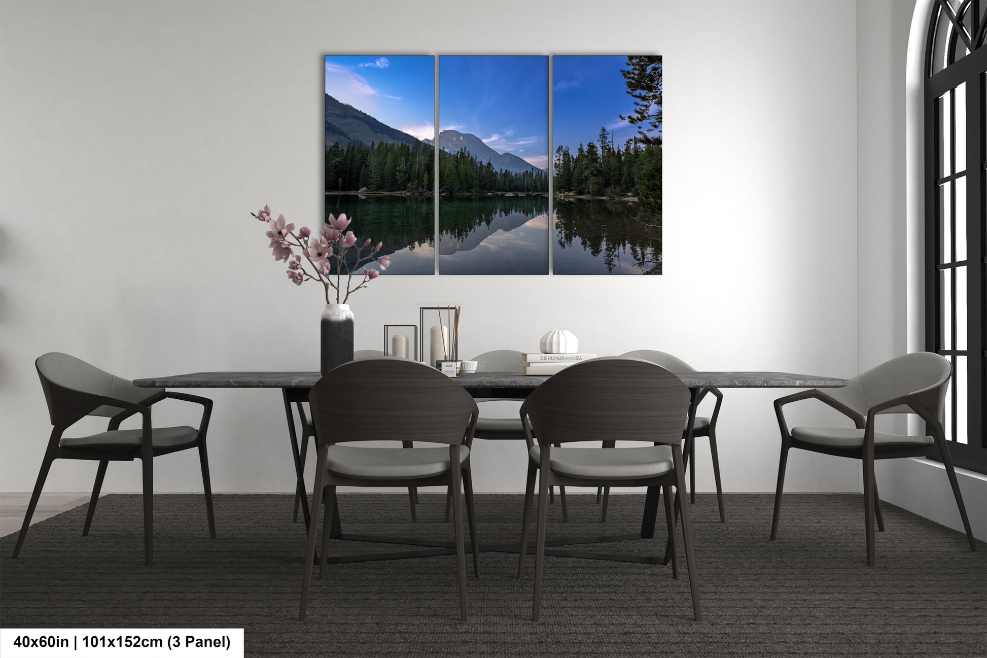 a dining room with a table and chairs