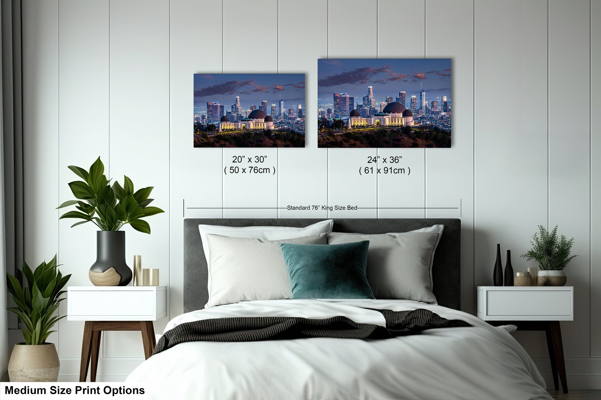 a bedroom with a bed and two pictures on the wall
