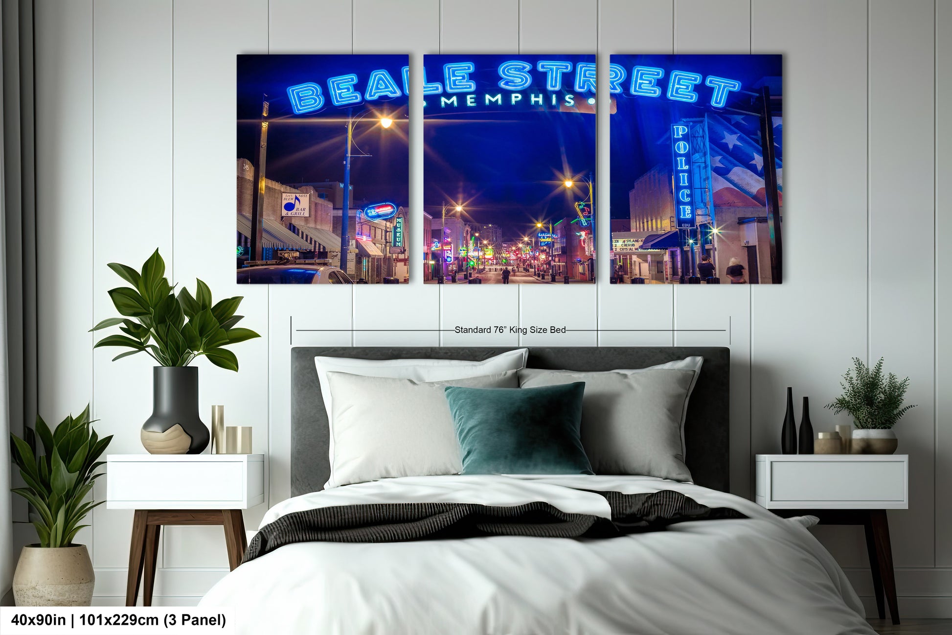 a bed room with a neatly made bed and three pictures on the wall