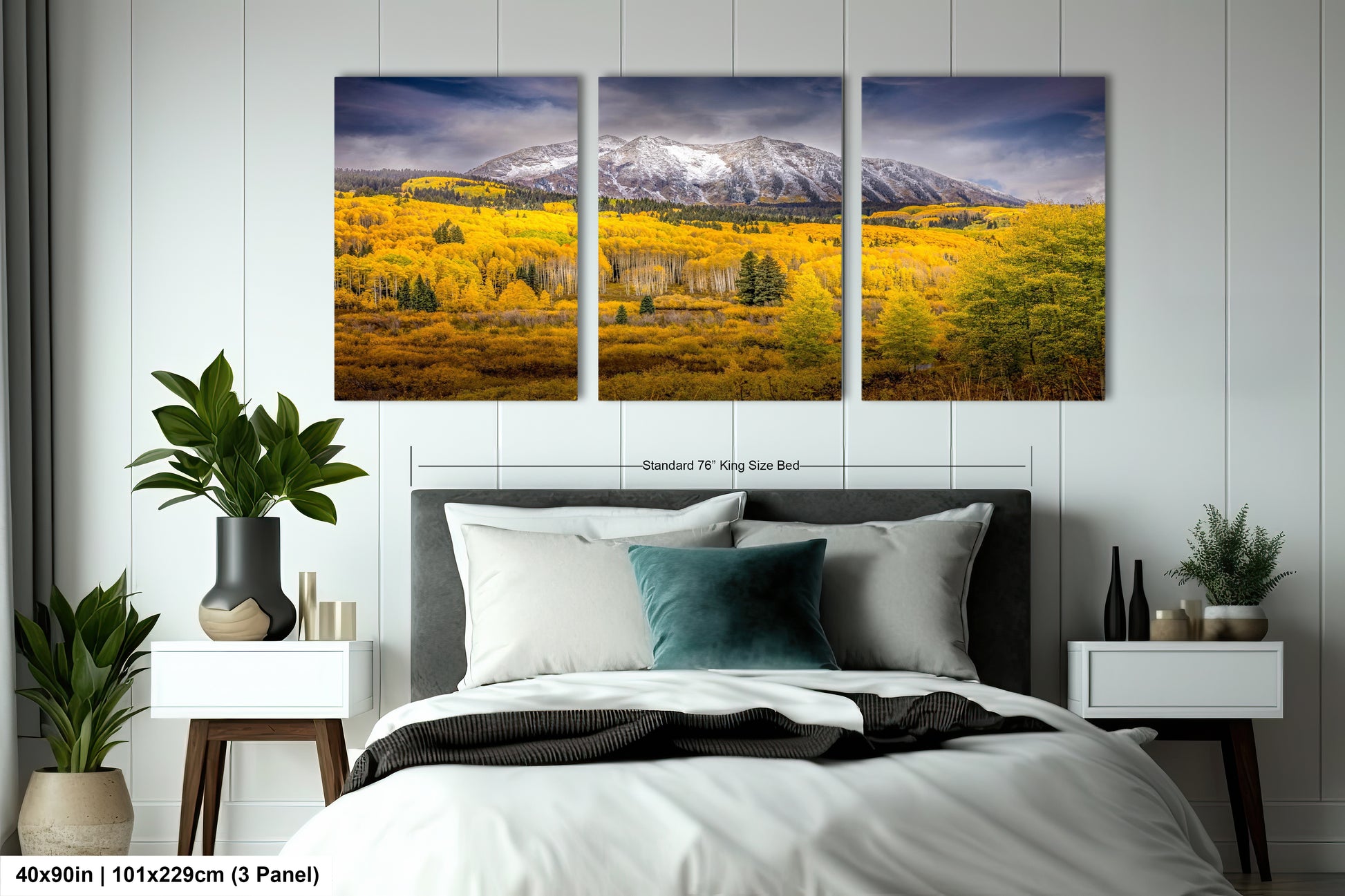a bed room with a neatly made bed and two pictures on the wall