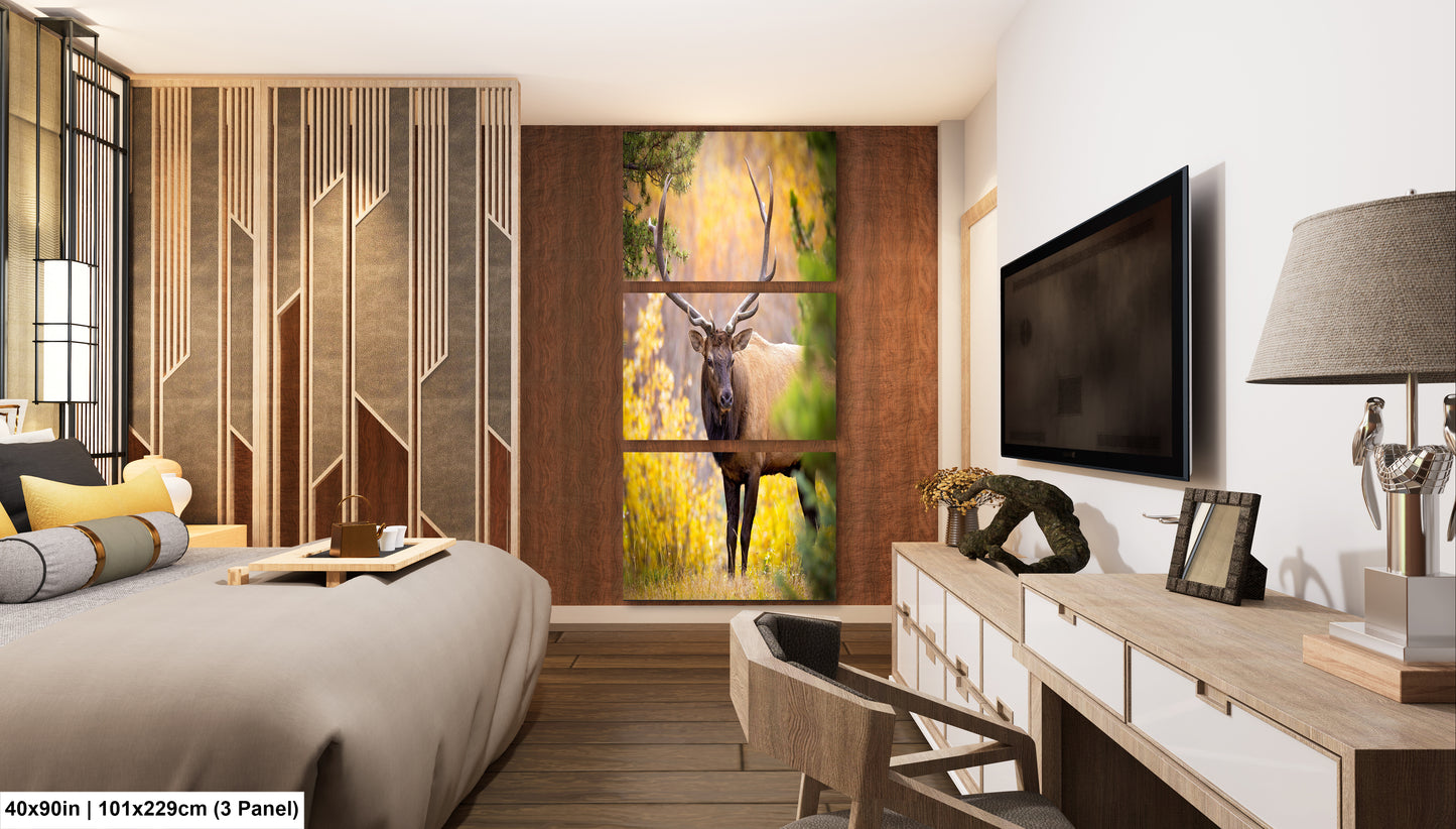 a bed room with a neatly made bed and a painting on the wall