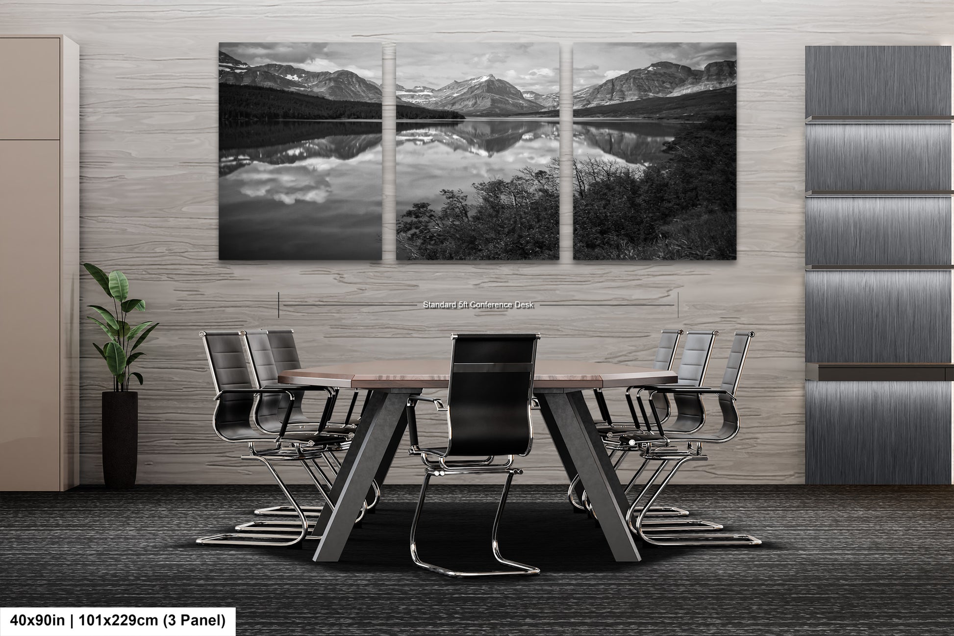 a black and white photo of a table and chairs