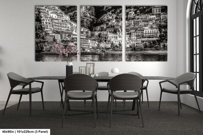 a black and white photo of a dining room