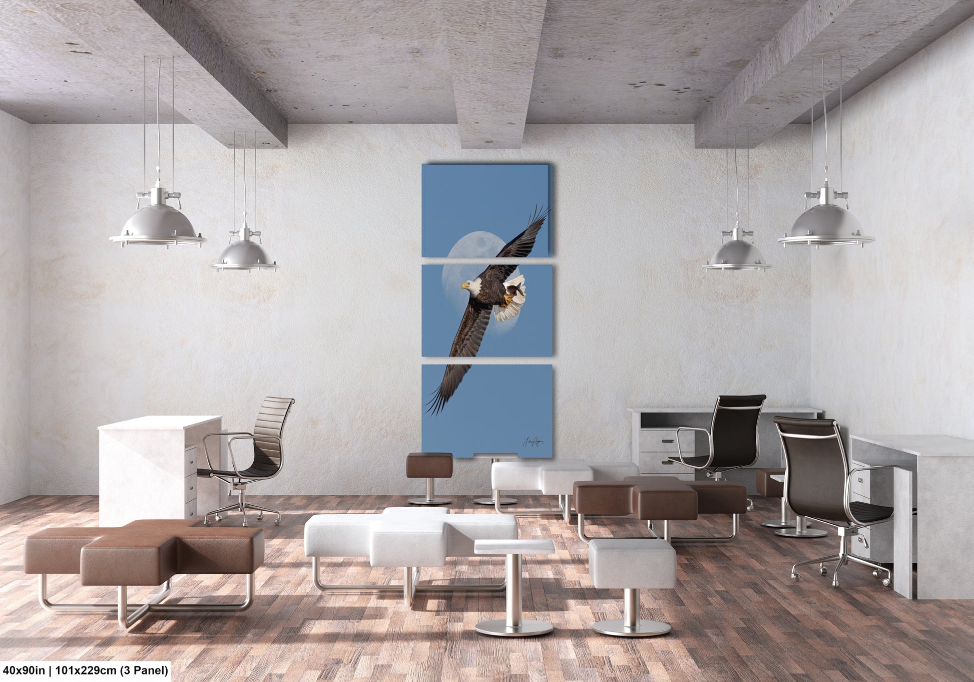 The image is a modern office space with a minimalist design. It features a large blue wall with a framed image of a bald eagle in flight, and several chairs and tables arranged throughout the space. The room has a clean, uncluttered appearance with a focus on functionality and simplicity.
