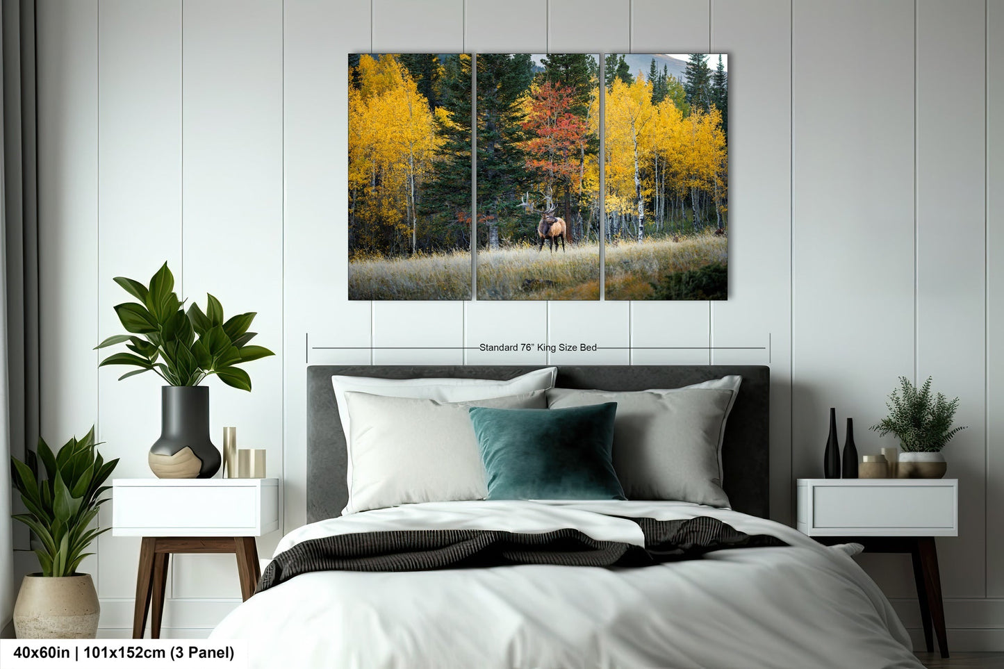 a bed room with a neatly made bed and a painting on the wall