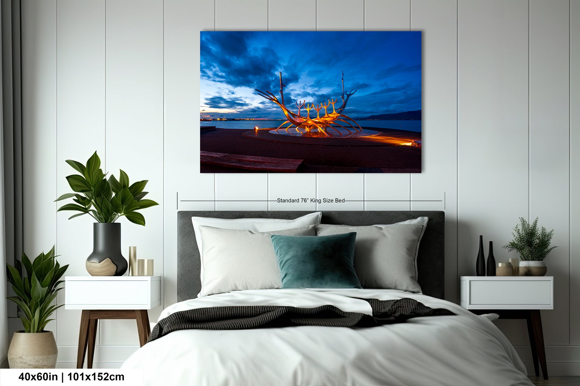 a bedroom with a bed and a painting on the wall
