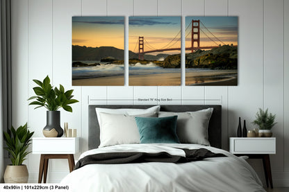 a bedroom with a bed and two paintings on the wall