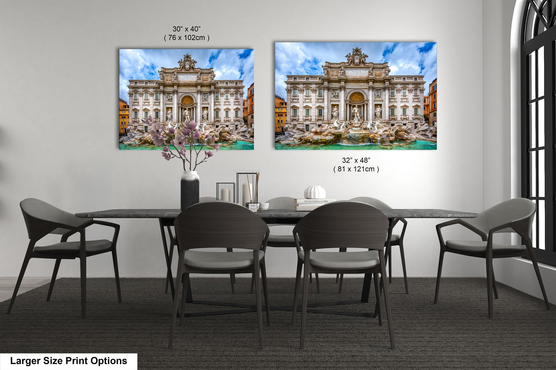 a dining room with a table and chairs