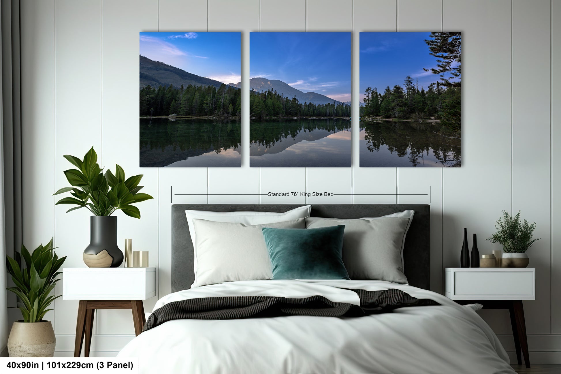 a bedroom with a large bed and three paintings on the wall
