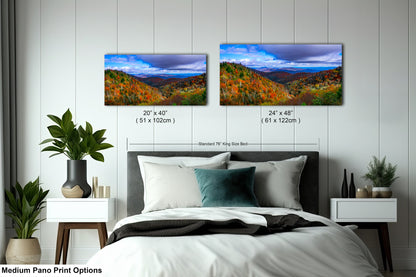 a bedroom with a bed and two pictures on the wall
