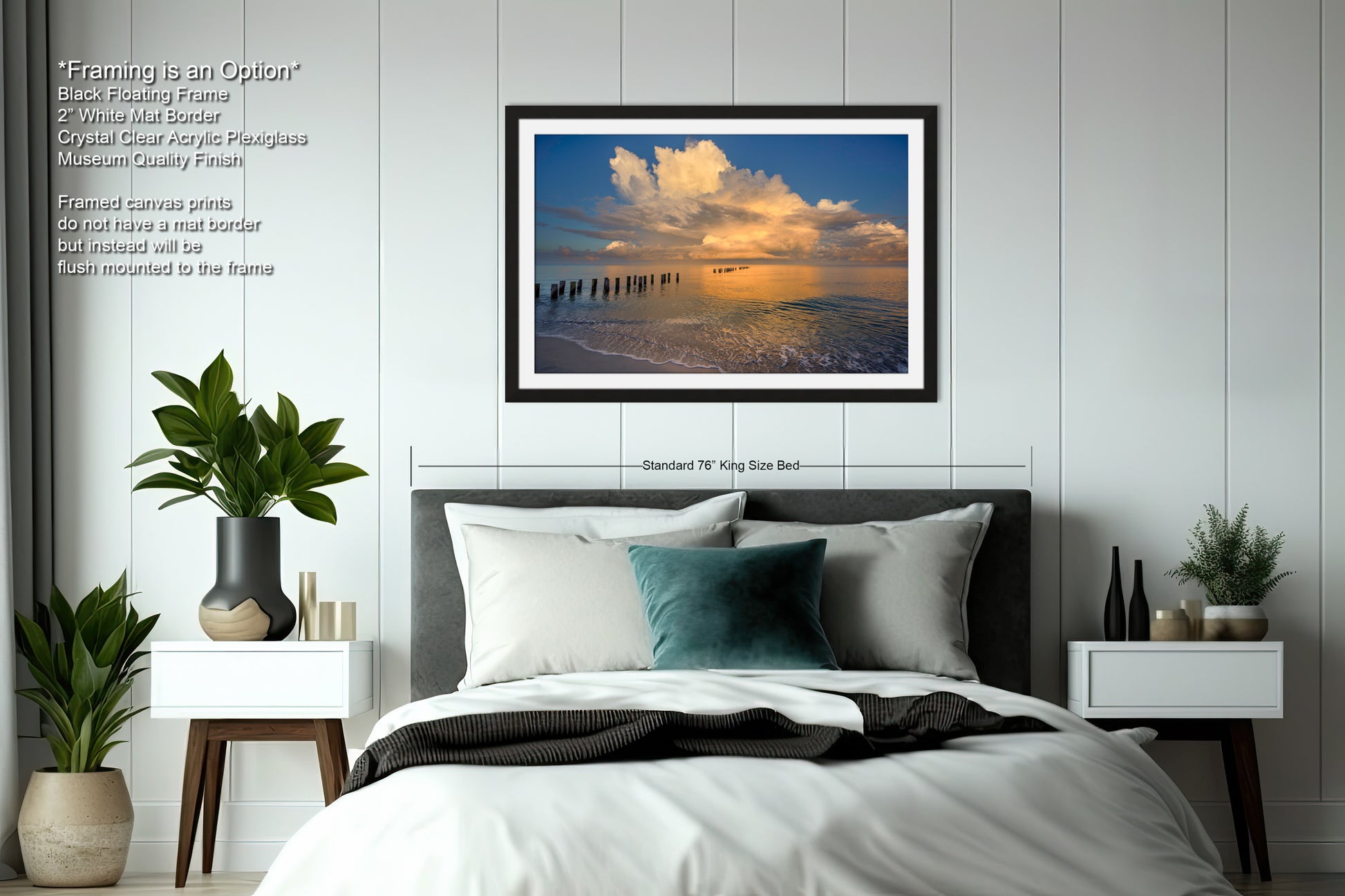 a bedroom with a bed and a picture hanging on the wall