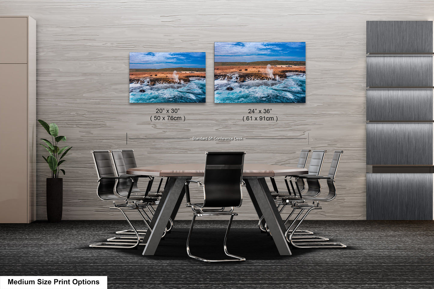 a dining room table with four chairs and two pictures on the wall