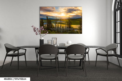 a dining room table with chairs and a painting on the wall