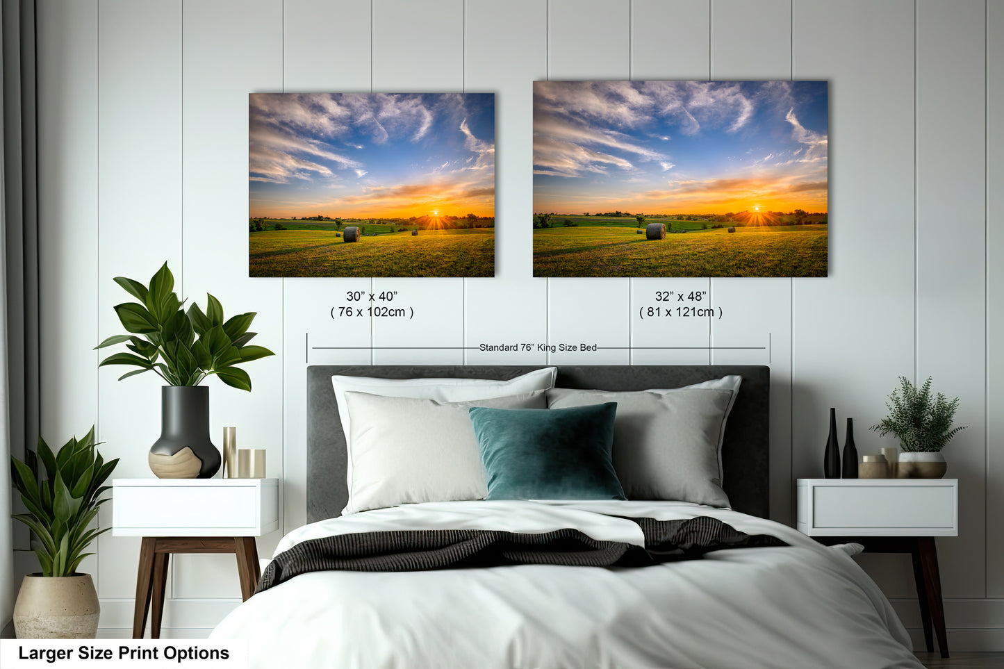 a bedroom with a bed and two pictures on the wall