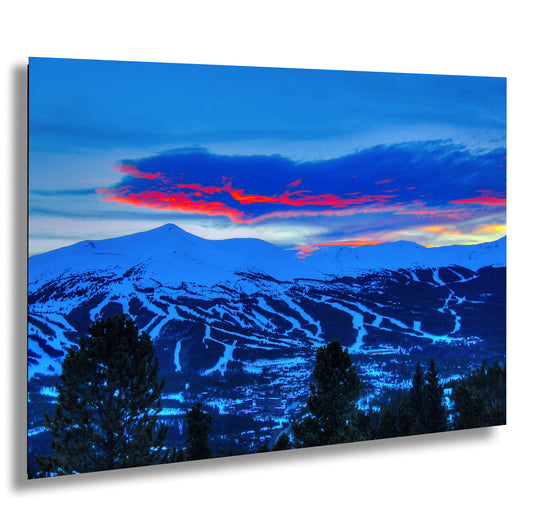 a view of a mountain range at sunset