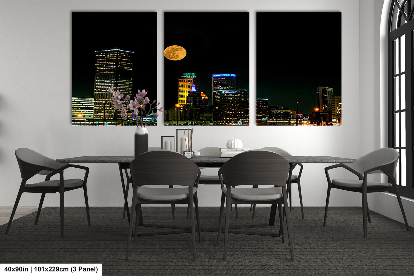 a dining room with a table and chairs