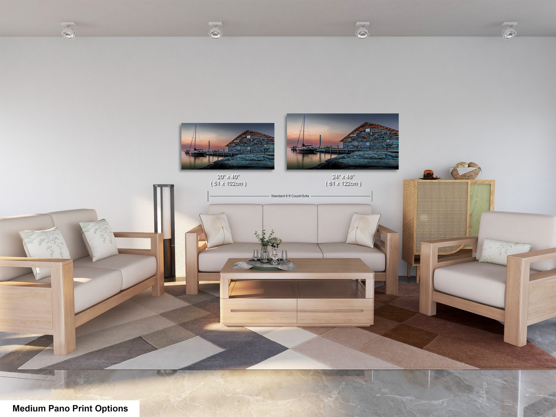 a modern living room with a large window, a white sofa, a coffee table, and two framed pictures of a boat on the wall.