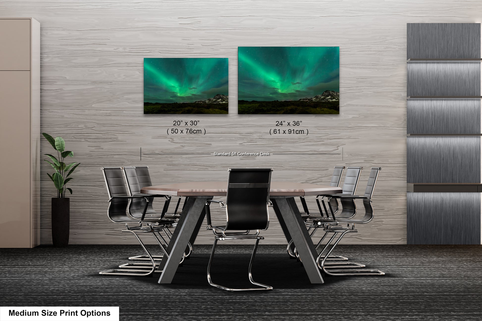 a dining room table with chairs and a picture of the northern lights