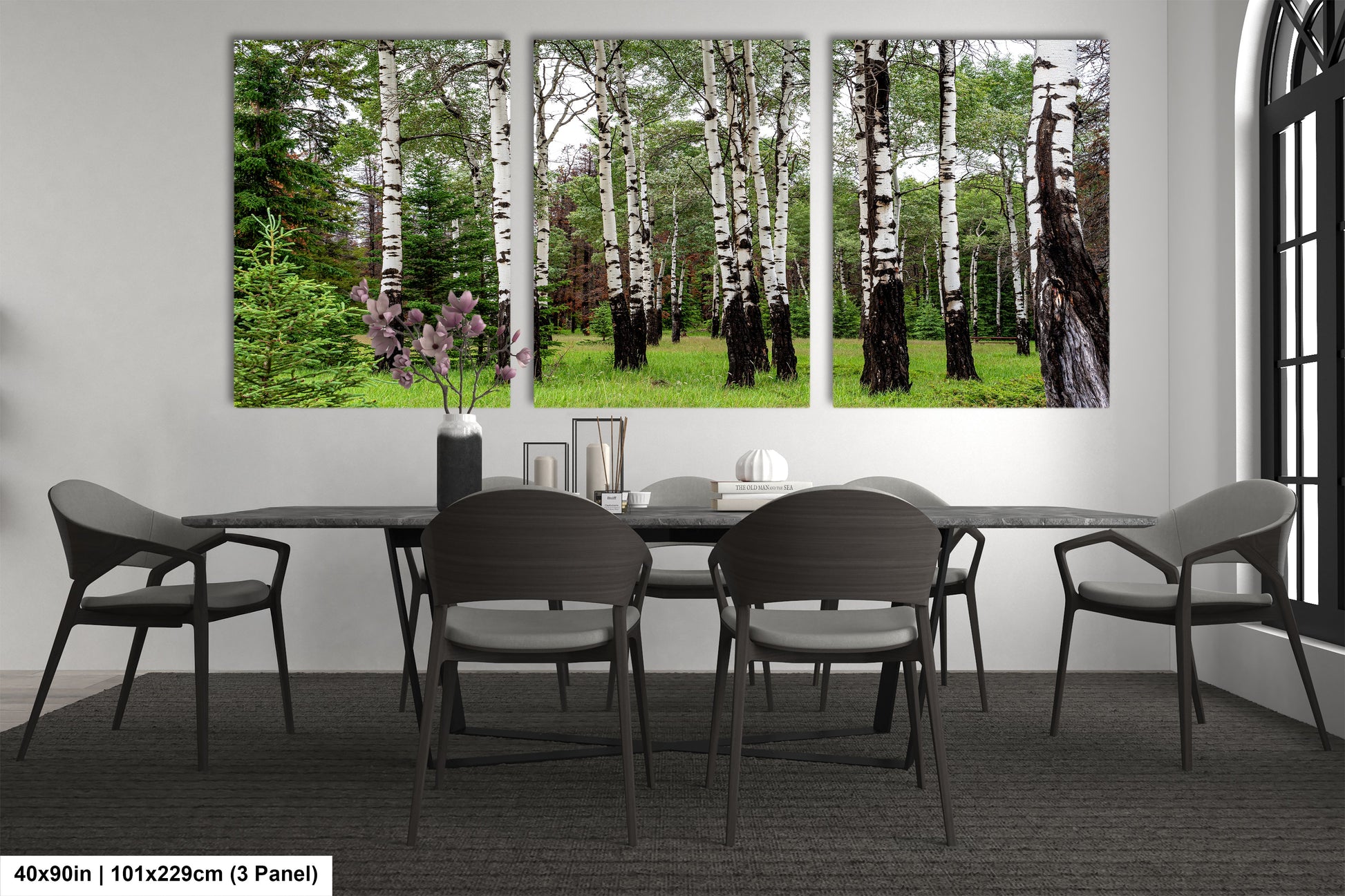 a dining room with a table and chairs