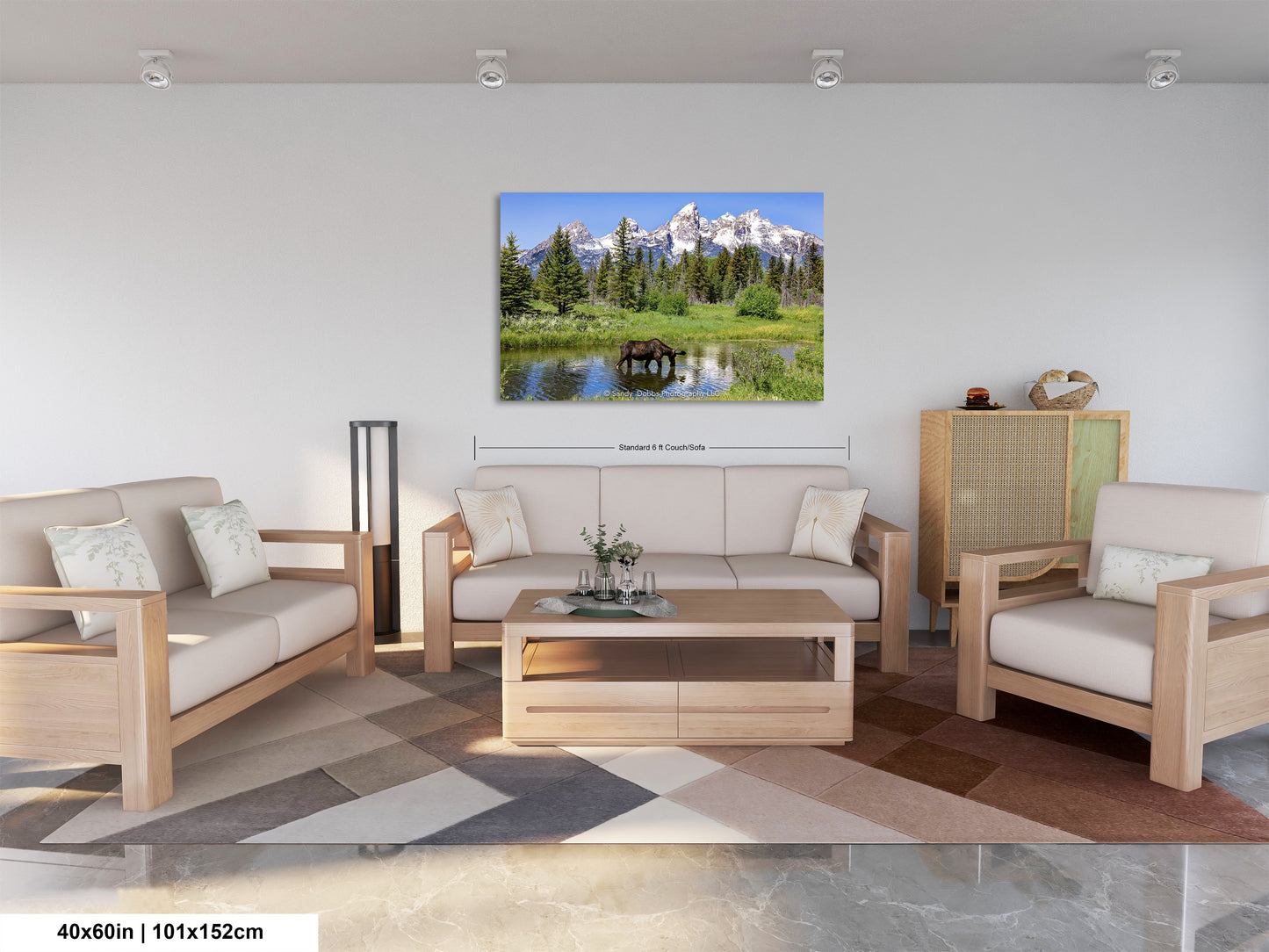 a living room filled with furniture and a painting on the wall