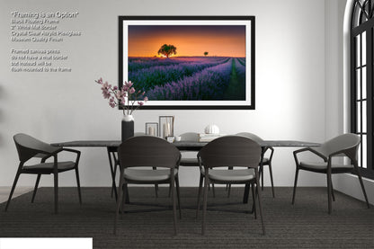 a picture of a dining room with a table and chairs
