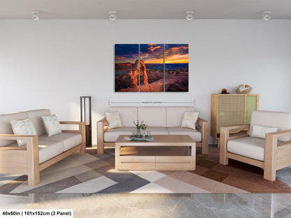 a living room filled with furniture and a painting on the wall