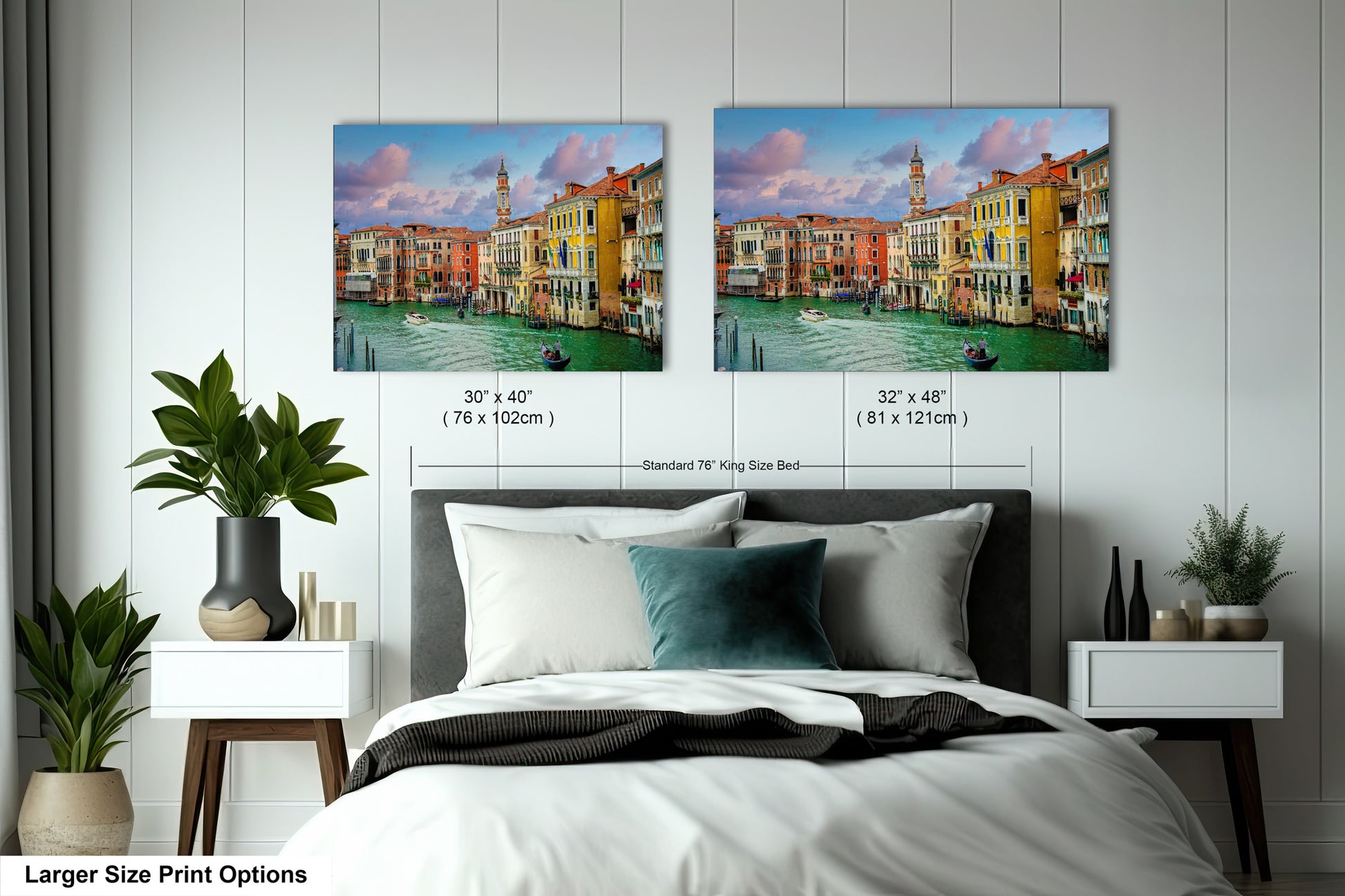 a bedroom with a bed and two pictures on the wall