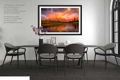 a dining room with a table and chairs