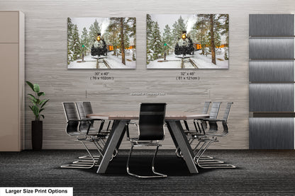a dining room table with chairs and two pictures on the wall