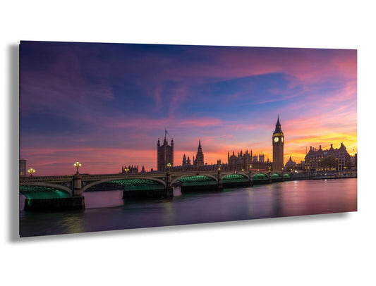a picture of a city with a bridge and a clock tower