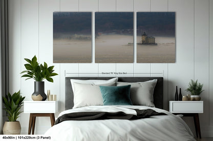 a bedroom scene with a bed and two paintings on the wall