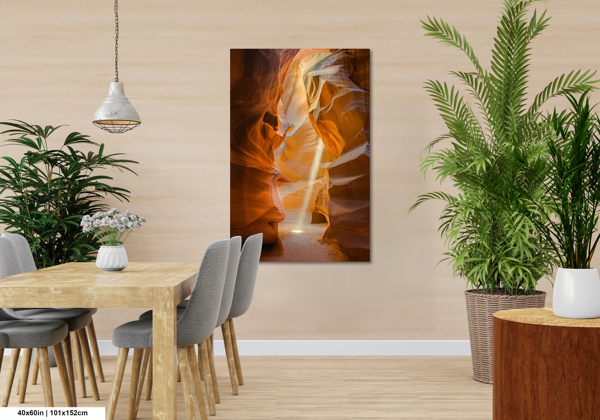 a room with a table, chairs and a painting on the wall