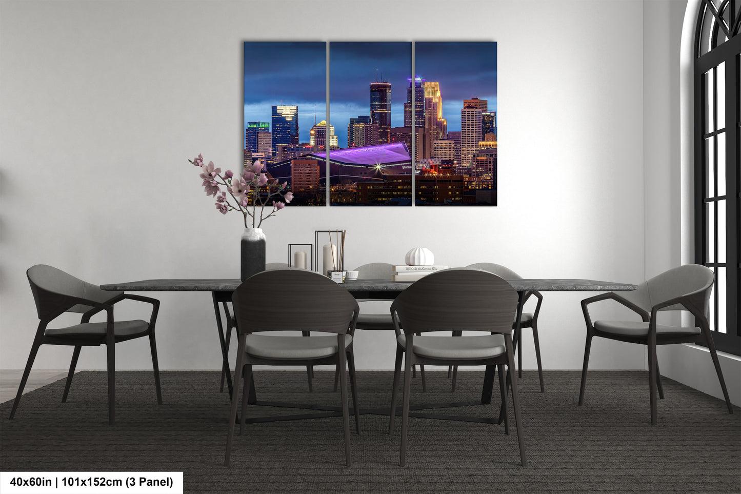a dining room with a table and chairs