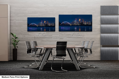 a dining room table with a view of a city at night