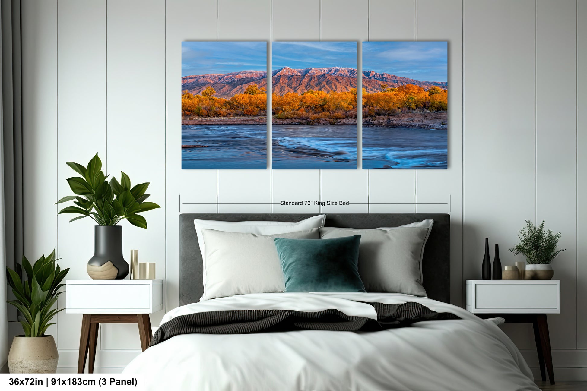 a bed room with a neatly made bed and three paintings on the wall