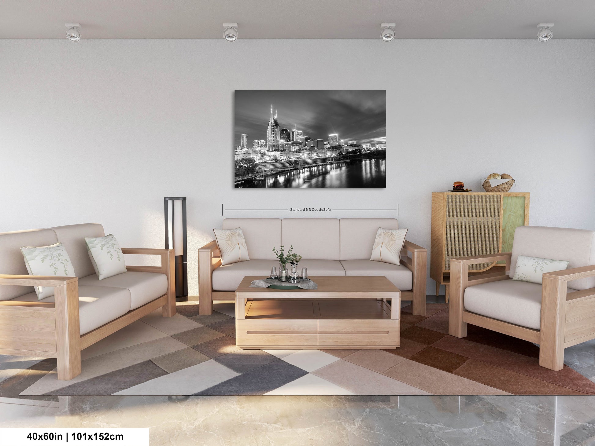 a living room filled with furniture and a painting on the wall