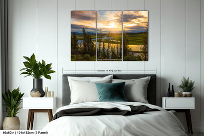 a bedroom with a large bed and a painting on the wall