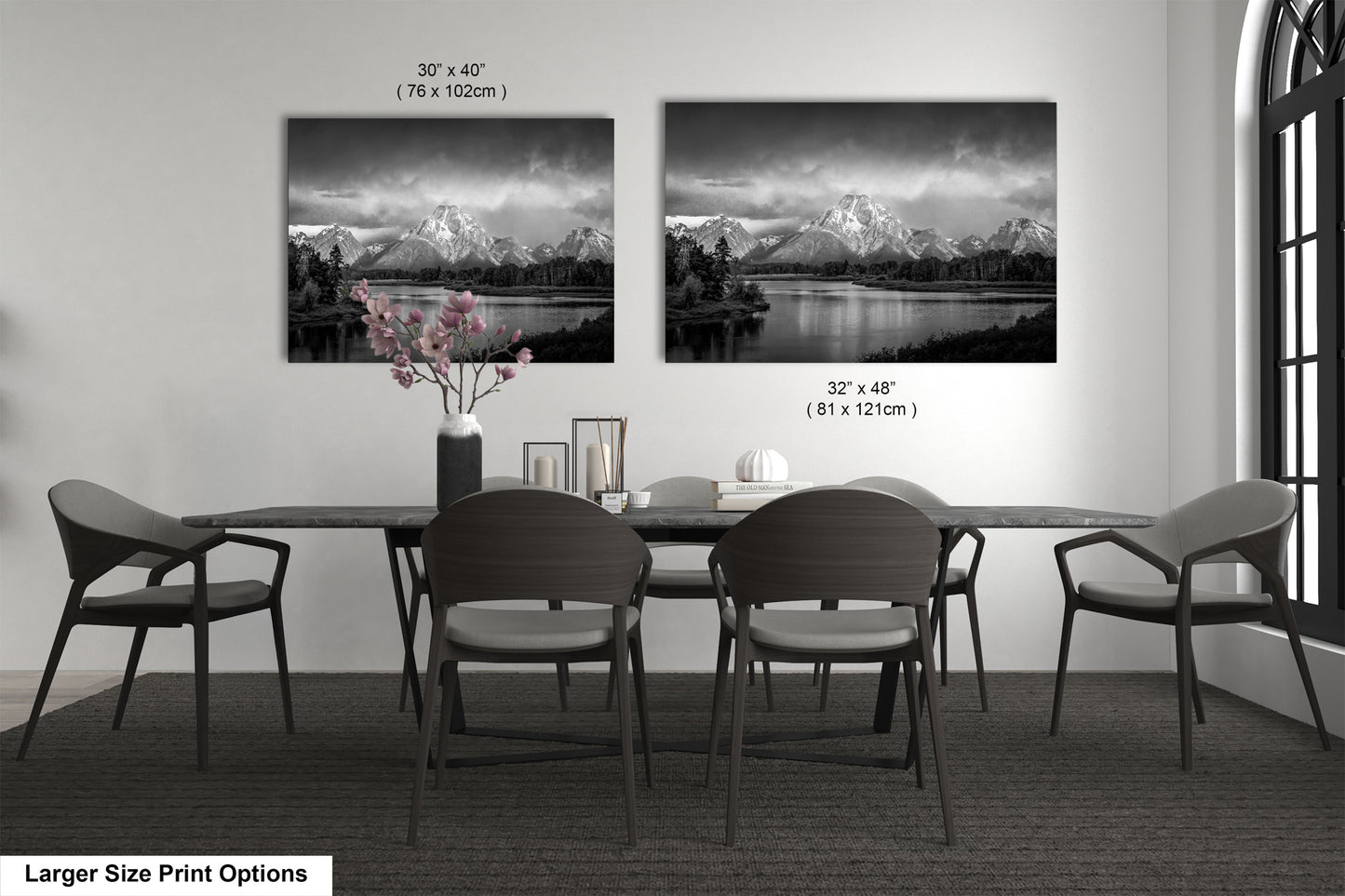 a black and white photo of a table and chairs