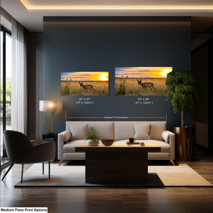 a modern living room with a large sofa, a coffee table, and a lamp. There are two framed landscape paintings hanging on the wall above the sofa, depicting a sunset over a field. The paintings are of similar size and style, and the text indicates that they are medium pano print options.