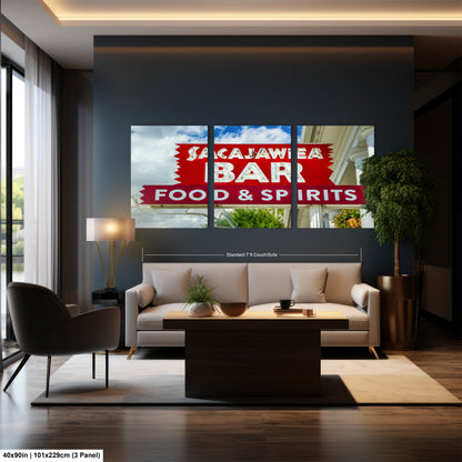 a living room filled with furniture and a large window