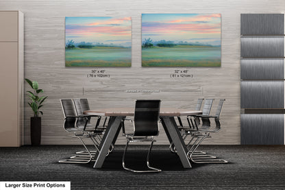 a dining room with two paintings on the wall