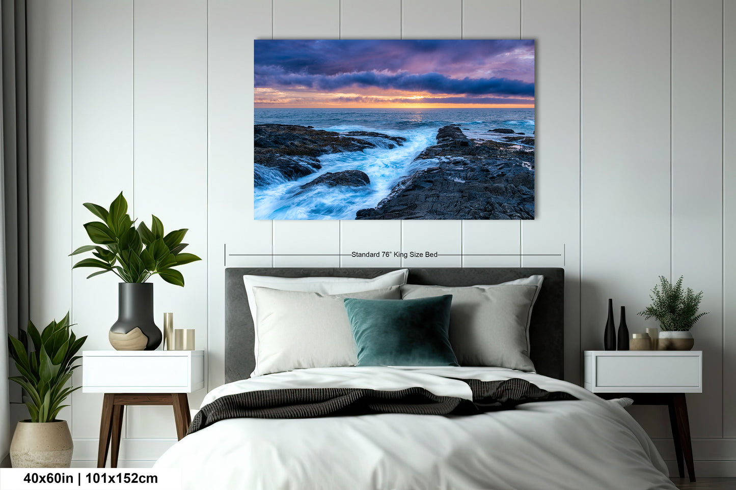a bedroom scene with focus on the bed and the ocean