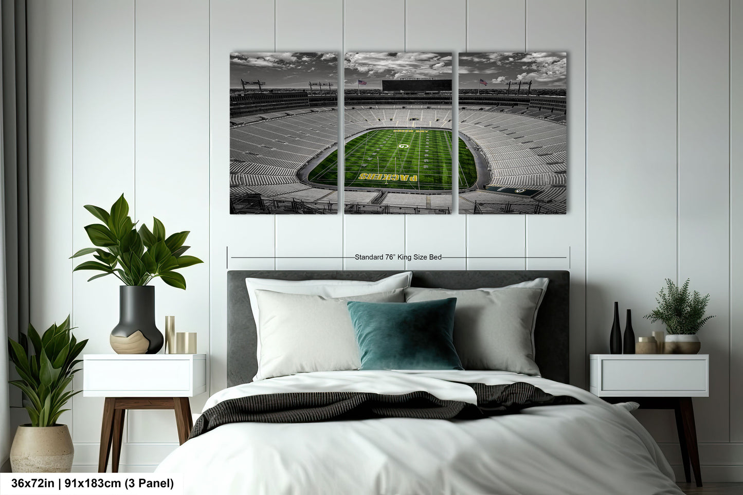 a bedroom with a large bed and a wall mounted picture of a football stadium